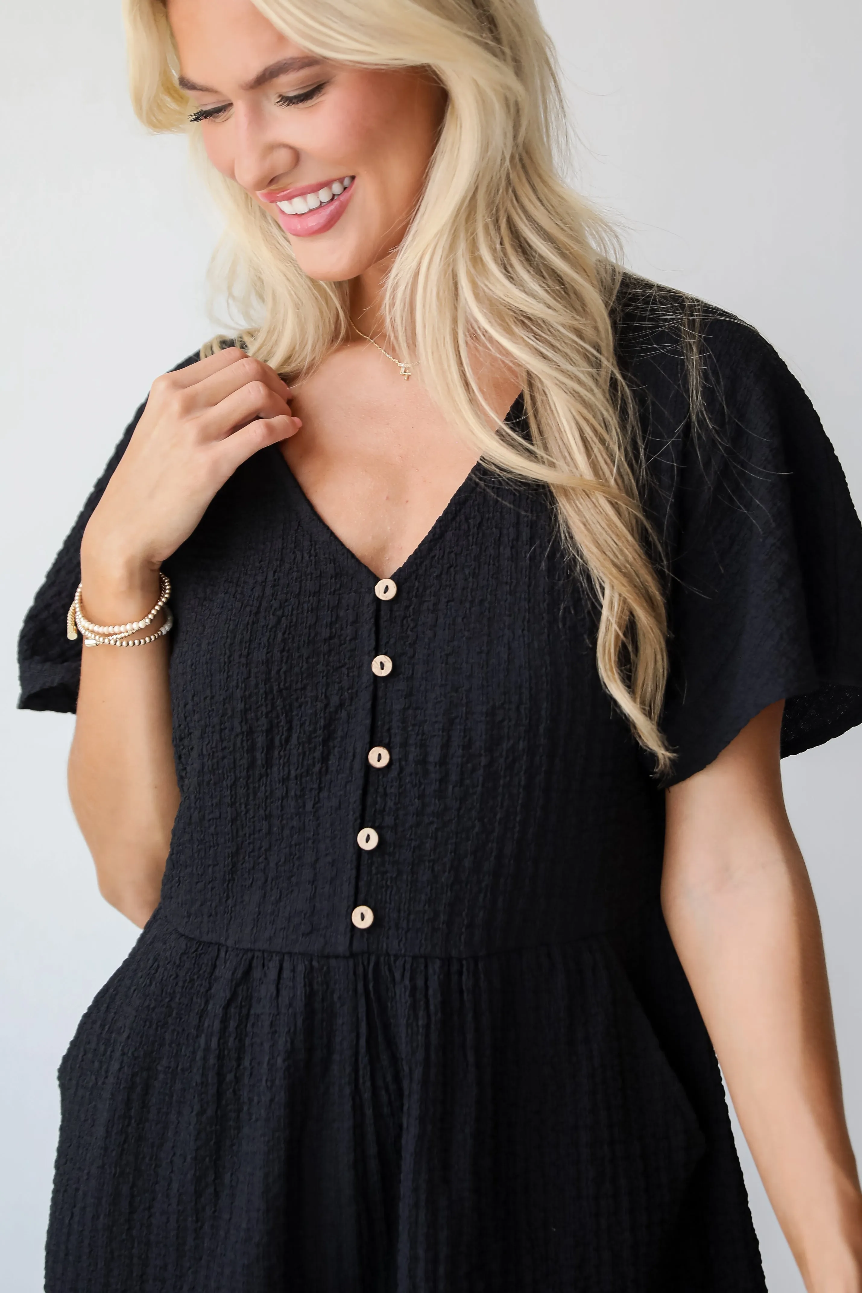 FINAL SALE - Skilled Poise Black Textured Romper